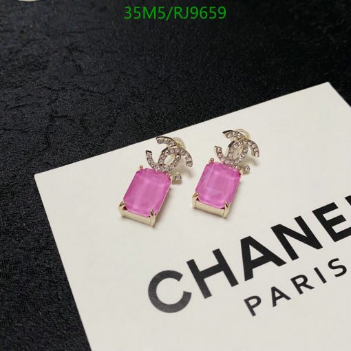 Elegant pink gemstone earrings on branded card.