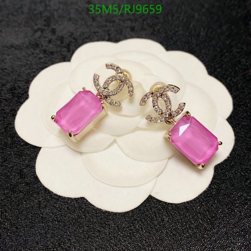 Elegant pink gemstone earrings with diamond accents.