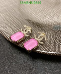 Elegant pink gemstone earrings with gold accents.