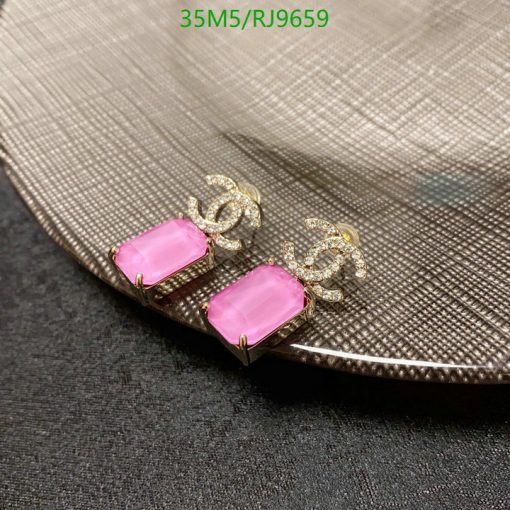 Elegant pink gemstone earrings with gold accents.