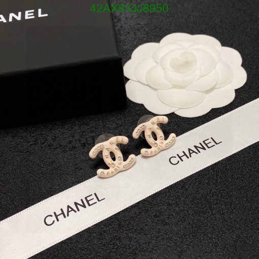 Designer logo earrings with packaging and decoration.