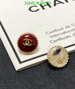 Designer button-style earrings on certificate.