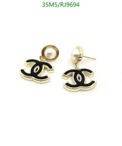 Gold pearl designer logo earrings.