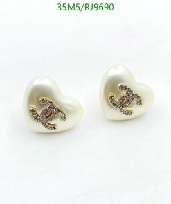 Pearl heart-shaped earrings with embellished logo design.