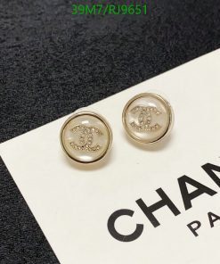 Designer logo earrings on display card.
