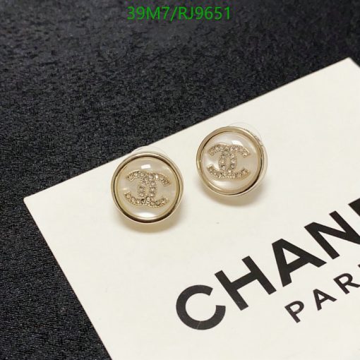 Designer logo earrings on display card.