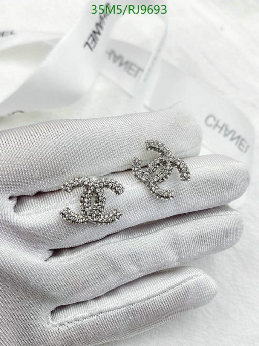 Silver brooches on gloves, luxury fashion accessory.