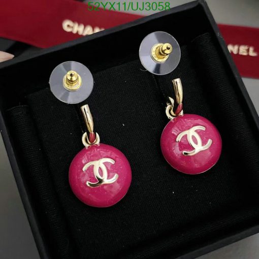 Designer pink drop earrings in box.