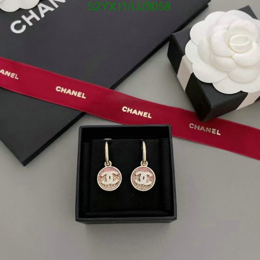 Designer logo earrings in display box with packaging.