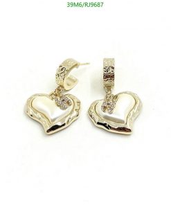 Gold heart-shaped hoop earrings with diamonds.