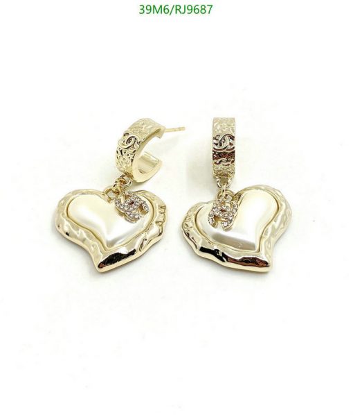 Gold heart-shaped hoop earrings with diamonds.