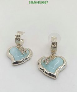 Silver heart-shaped earrings with blue enamel.