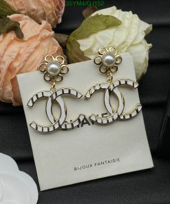 Pearl accent fashion earrings with floral design.