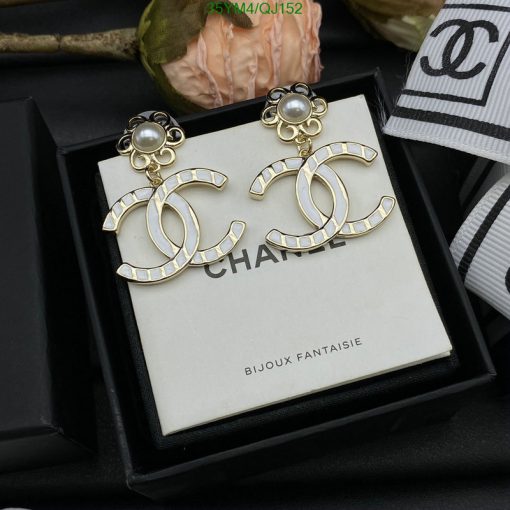 Pearl-accented designer-logo earrings in presentation box.