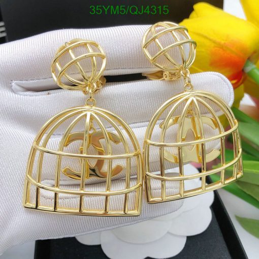 Gold birdcage-style dangle earrings.