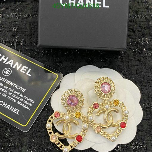 Chanel earrings with gemstones and packaging.