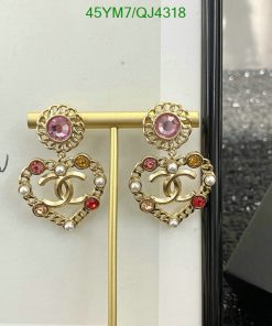 Gold heart-shaped earrings with pearls and pink stones.