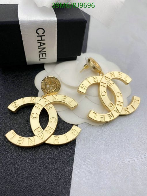 Chanel gold-tone logo earrings with box.