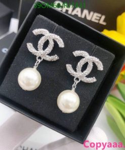 Chanel-style pearl drop earrings in presentation box.