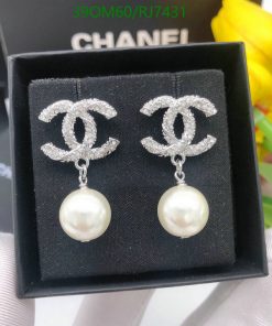 Designer pearl and crystal logo earrings in box.