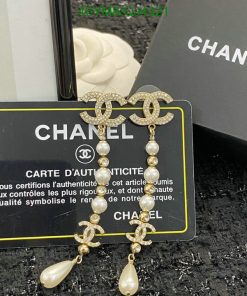 Chanel earrings with authenticity card and packaging.