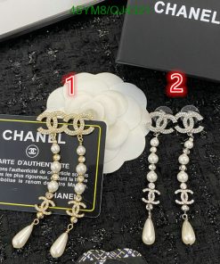 Chanel branded pearl and diamond earrings with authenticity card.