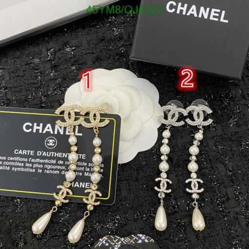 Chanel branded pearl and diamond earrings with authenticity card.