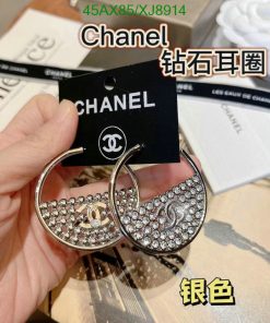 Chanel rhinestone hoop earrings with brand tag