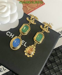 Designer-style gold-tone earrings with colorful gemstones.