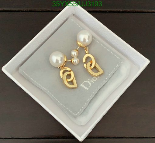 Designer pearl drop earrings in presentation box.