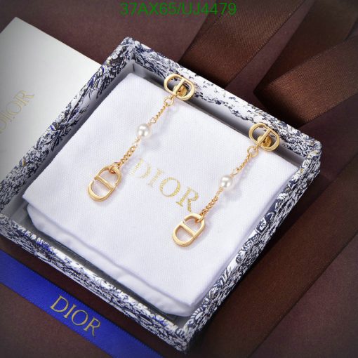 Dior pearl gold earrings in branded box.