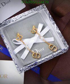 Dior pearl earrings in elegant presentation box.