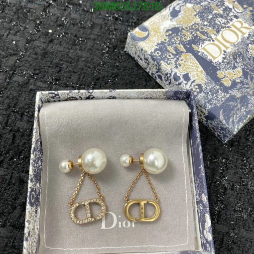 Dior pearl earrings with logo in branded box.