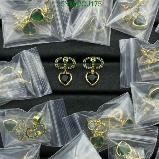 Assorted packaged green heart earrings.