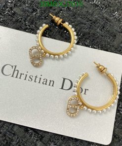 Pearl-embellished gold-tone hoop earrings on card.