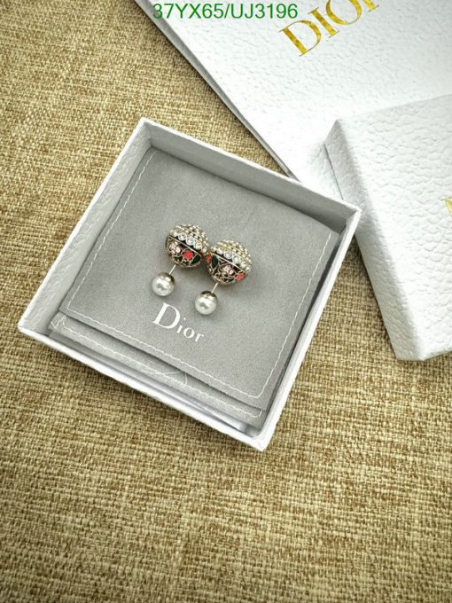 Dior bow earrings with pearls in branded box.