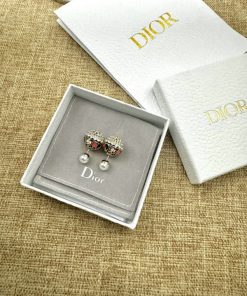 Dior earrings in box with branded packaging.