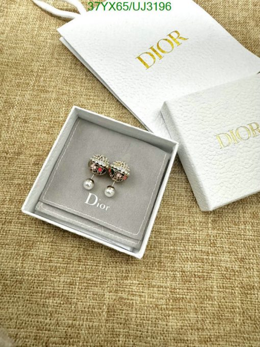 Dior earrings in box with branded packaging.