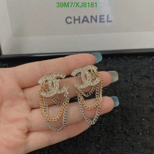 Chanel logo earrings with rhinestones and chain detail.