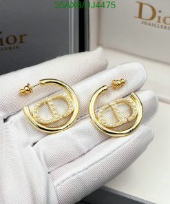 Elegant Dior pearl gold hoop earrings on display.