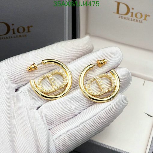 Elegant Dior pearl gold hoop earrings on display.