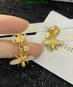 Gold bee and star earrings with crystals.