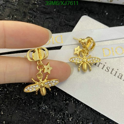 Gold bee and star earrings with crystals.