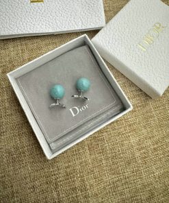 Designer turquoise earrings in branded box.