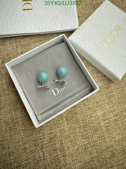 Designer turquoise earrings in branded box.