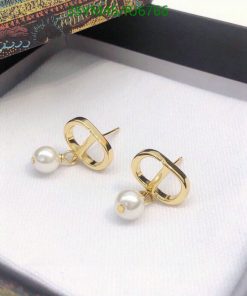 Gold pearl earrings in box