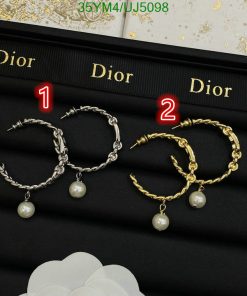 Dior silver and gold hoop earrings with pearls.