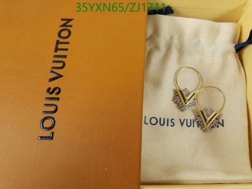 Louis Vuitton earrings on pouch with box.