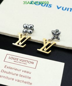 Louis Vuitton flower and logo earrings on display.