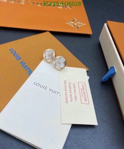 Louis Vuitton packaging and flower-shaped earrings.